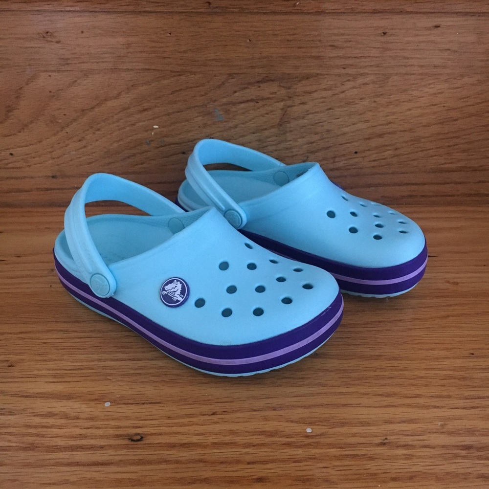 Blue and purple Crocs